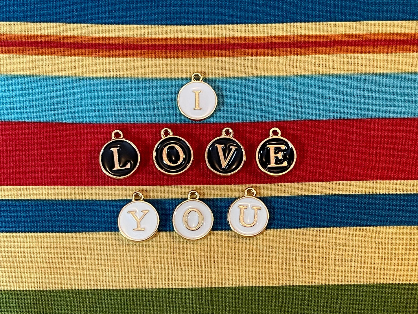 Letter charms–choose black, white, blue, pink, red, yellow, purple or green. Spell name, initials (double sided enamel alphabet jewelry)