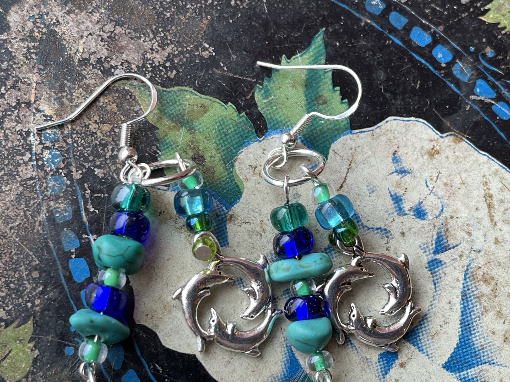 Dolphin coins dangle earrings - Earth Day Sterling Silver plated designer jewelry - Three dolphins sea life charm - blue glass turquoise gem