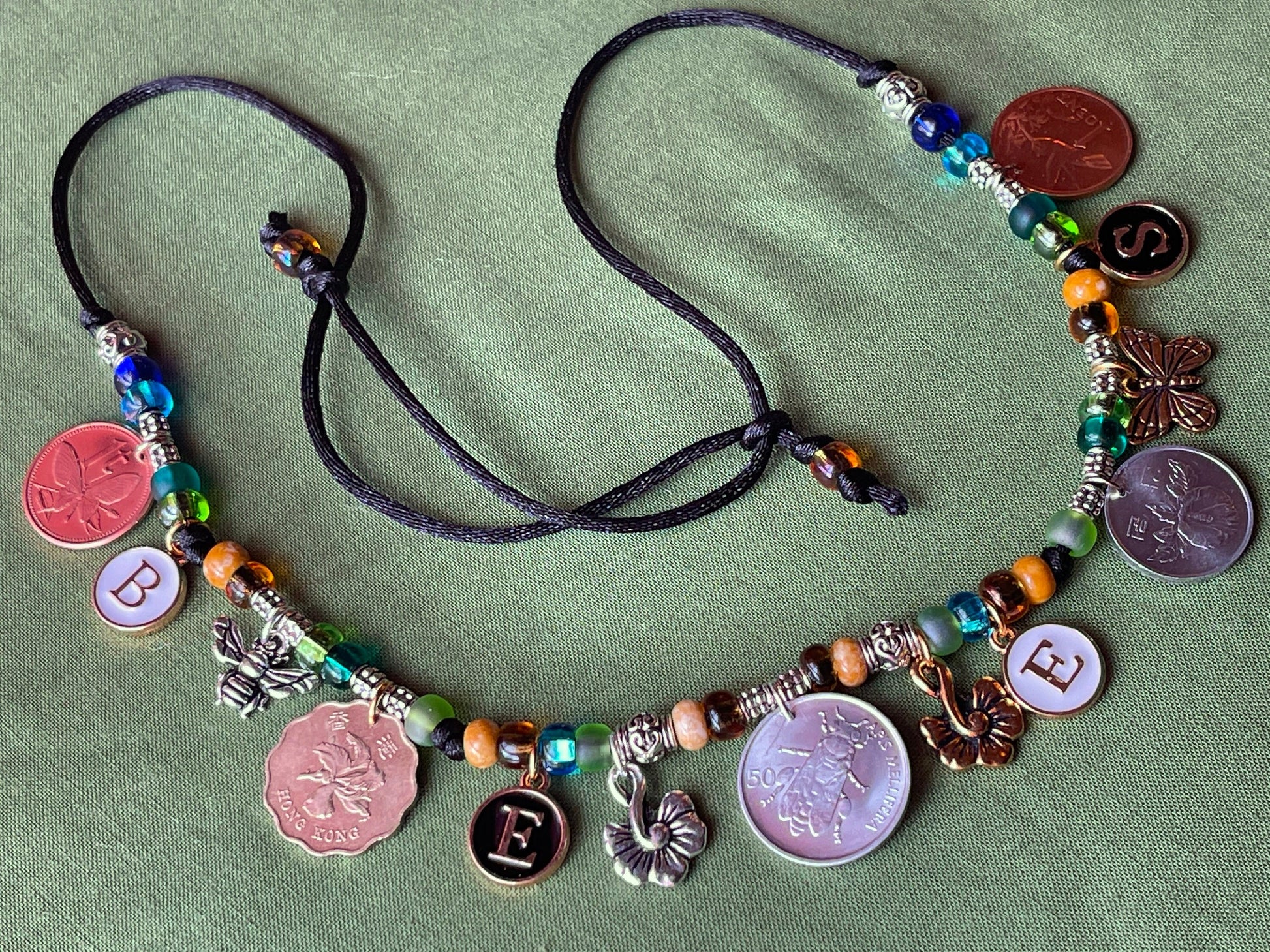 BEES necklace–coins, letter charms: honeybee-butterfly-hummingbird, flower coins–lotus orchid rose–bee charms–adjustable satin cord bead kit