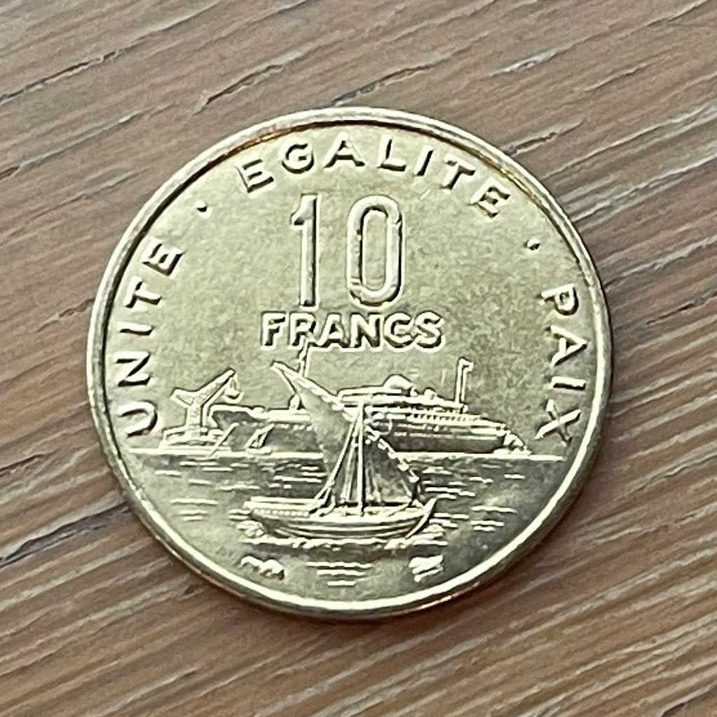 Sailing Dhow and Ocean Liner in Harbor & Jile Daggers of Tribes 10 Francs Djibouti Authentic Coin Money for Jewelry (Unity Equality Peace)