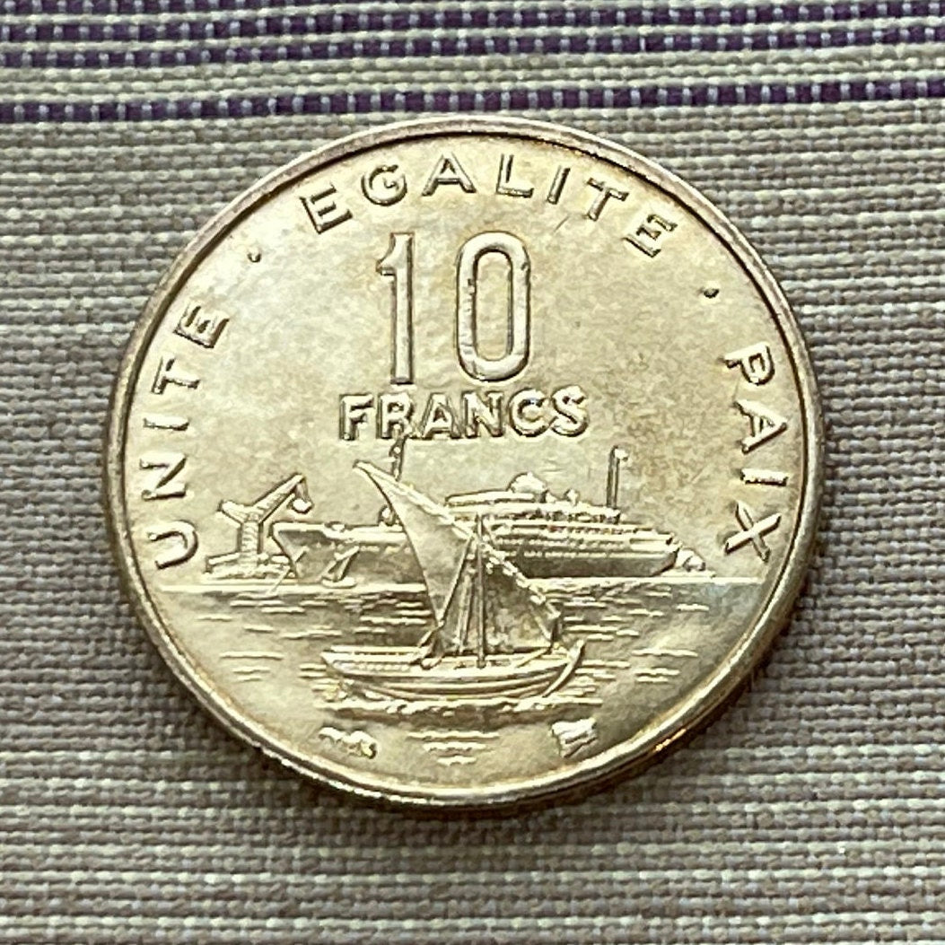 Sailing Dhow and Ocean Liner in Harbor & Jile Daggers of Tribes 10 Francs Djibouti Authentic Coin Money for Jewelry (Unity Equality Peace)