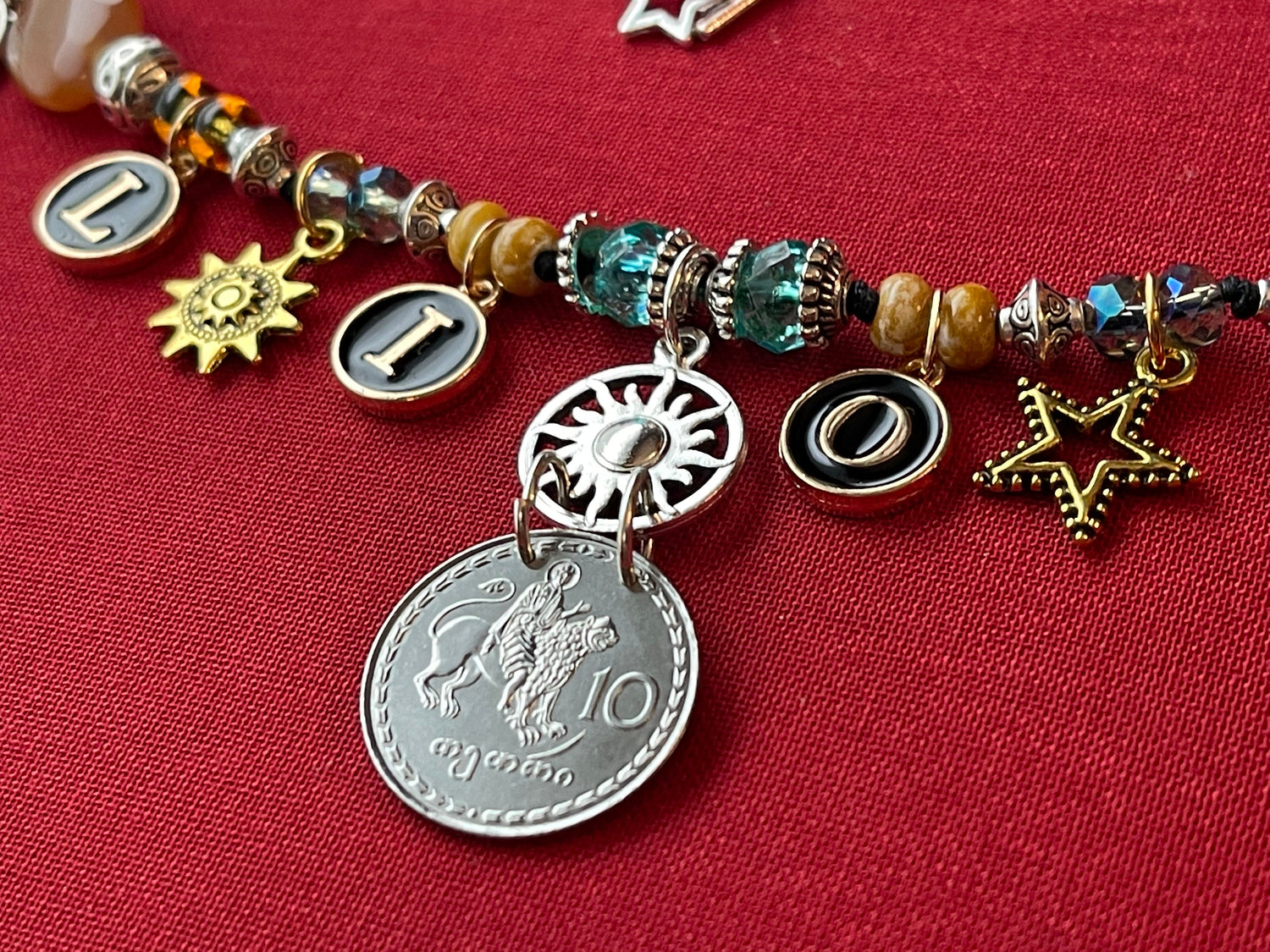LION Leo necklace–enamel letters, silver toggle–St. Mamas riding lion, Ethiopian lion coins–animal charms–picture jasper–crystal (astrology)