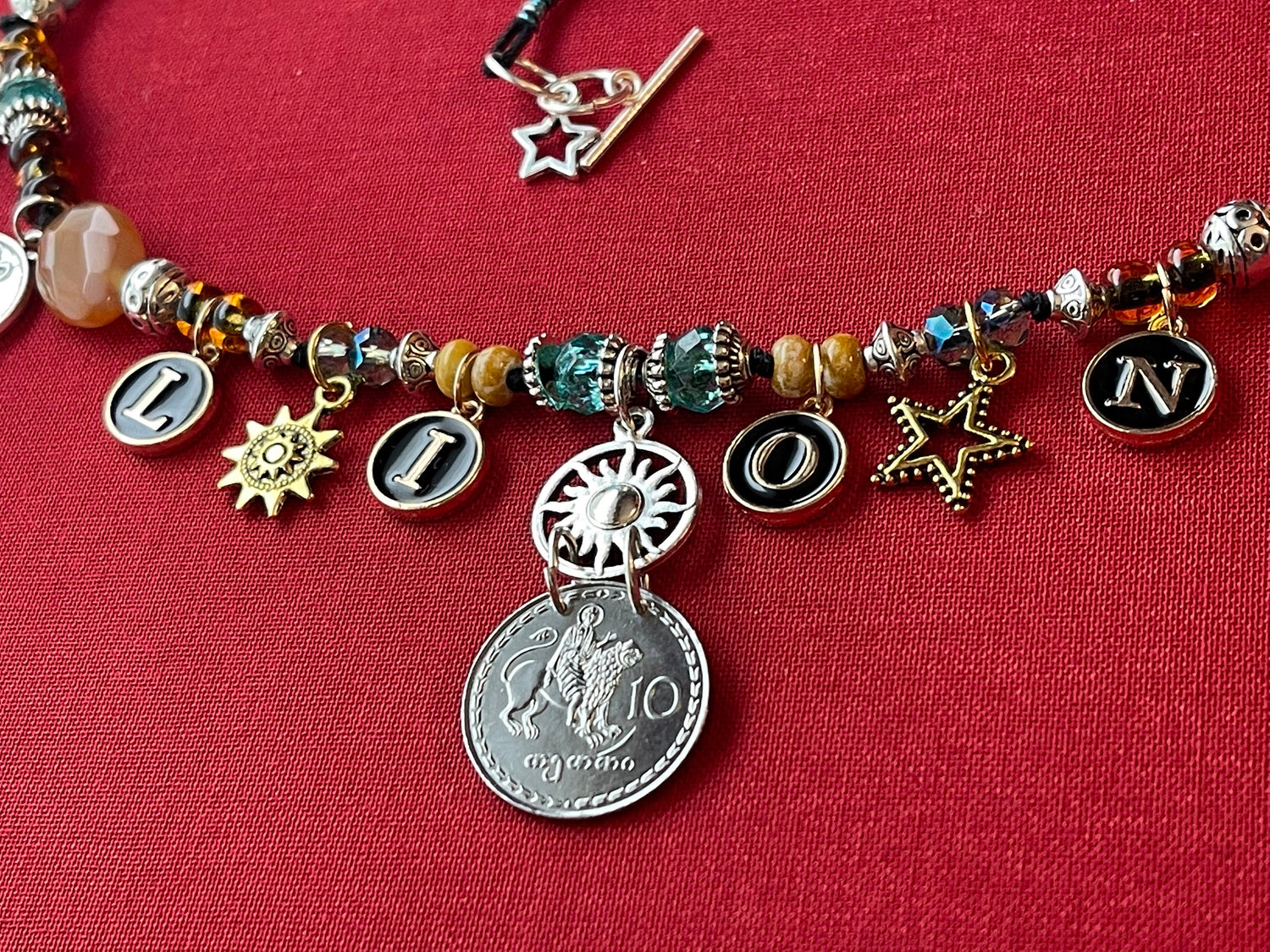 LION Leo necklace–enamel letters, silver toggle–St. Mamas riding lion, Ethiopian lion coins–animal charms–picture jasper–crystal (astrology)
