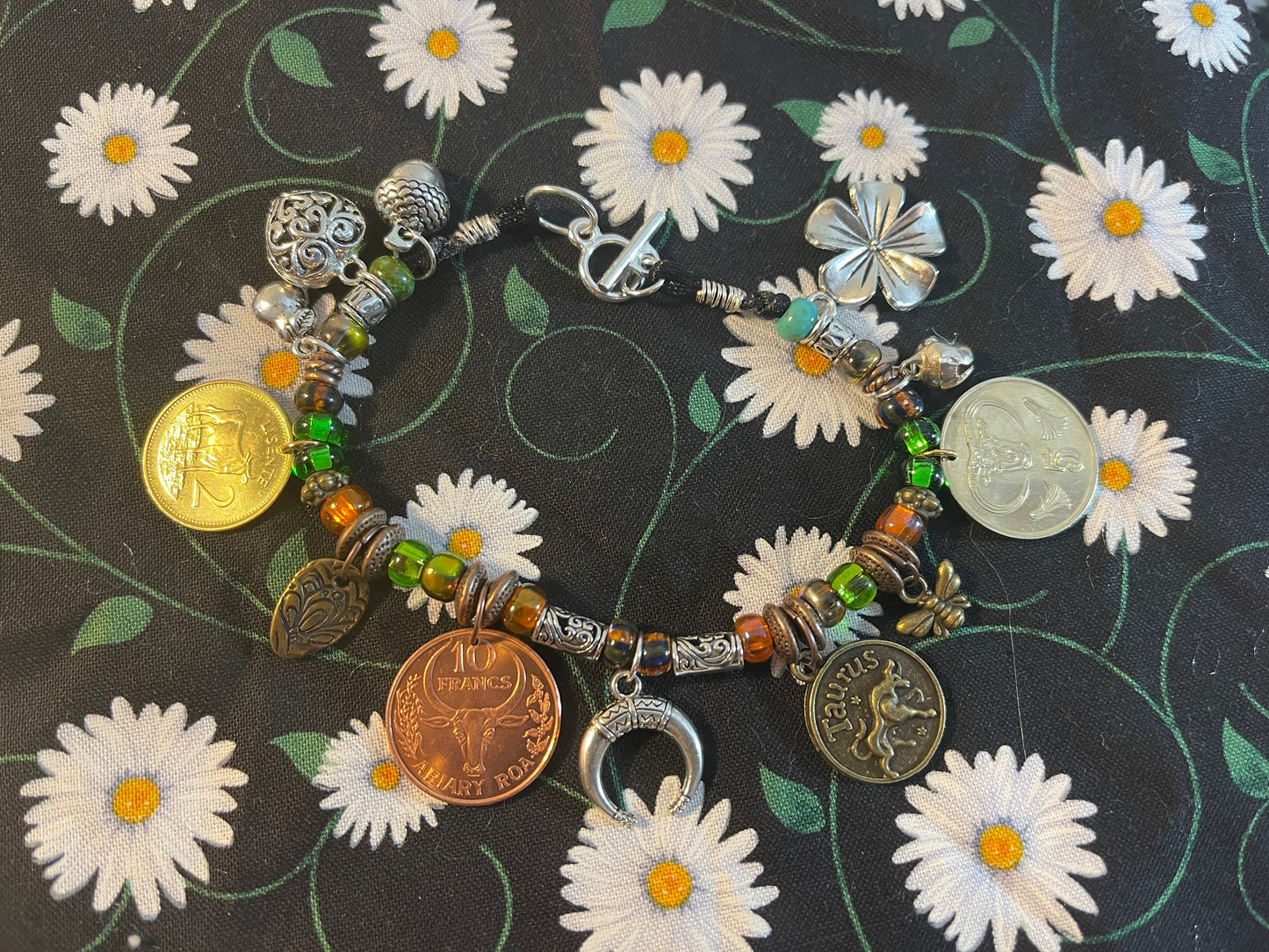 Taurus/Ferdinand the Bull genuine world coin jingle charm bracelet (flower–bell–tinkly heart–bee–moon) Czech glass, silver toggle (zodiac)