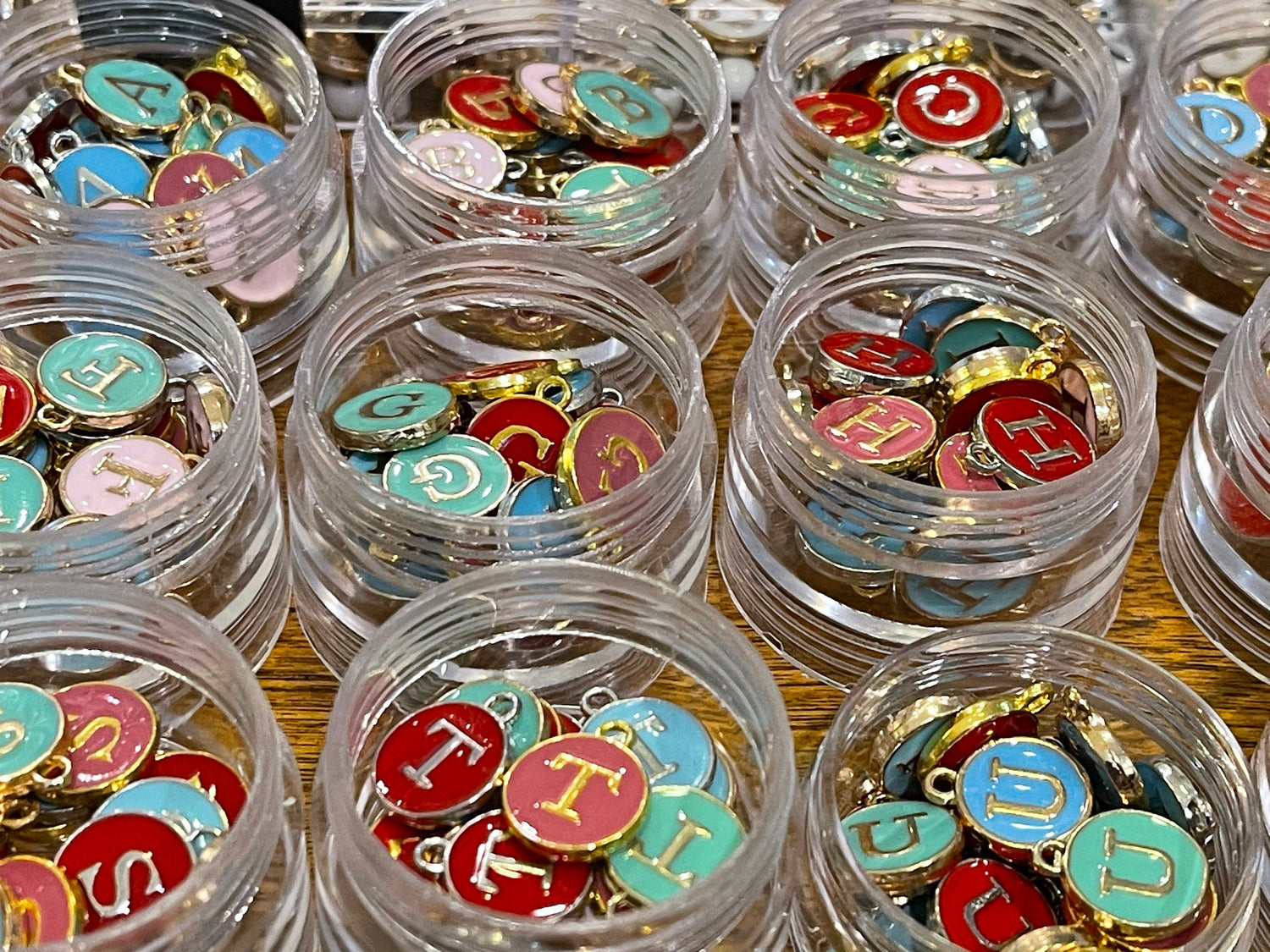 Letter charms–choose black, white, blue, pink, red, yellow, purple or green. Spell name, initials (double sided enamel alphabet jewelry)