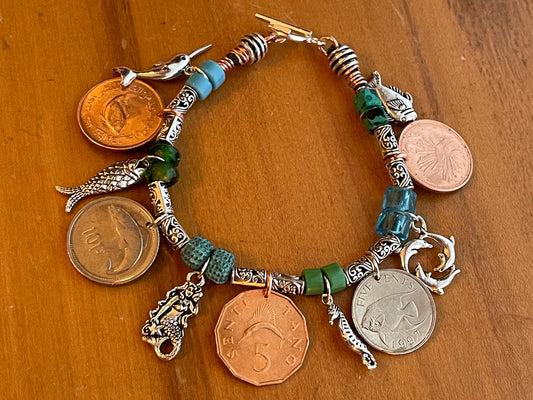 Mermaid fish chunky charm bracelet with genuine world coins, angelfish, narwhal, salmon, lionfish, sailfish, seahorse, fire-polished crystal