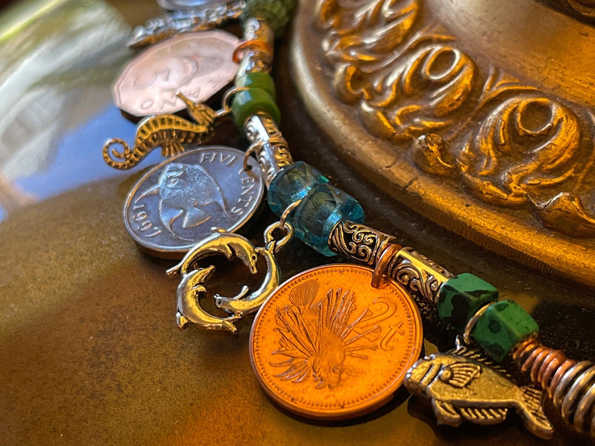 Mermaid fish chunky charm bracelet with genuine world coins, angelfish, narwhal, salmon, lionfish, sailfish, seahorse, fire-polished crystal