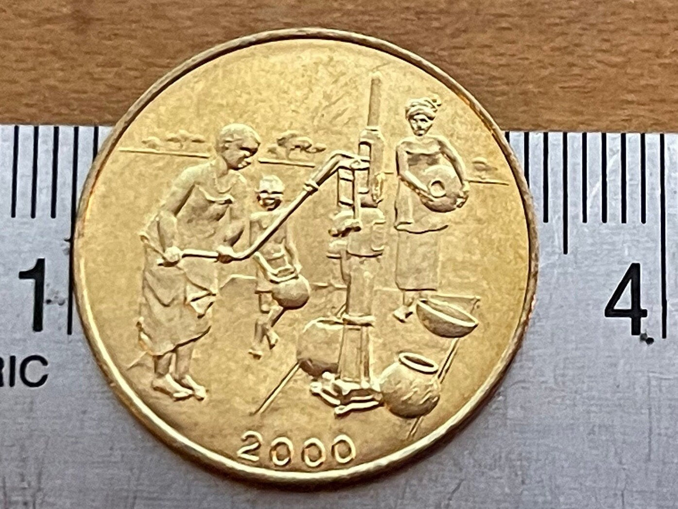 Human Right to Water: Women at Hand-Pump Well & Akan Sawfish Goldweight 10 CFA Francs West African States Authentic Coin Money for Jewelry