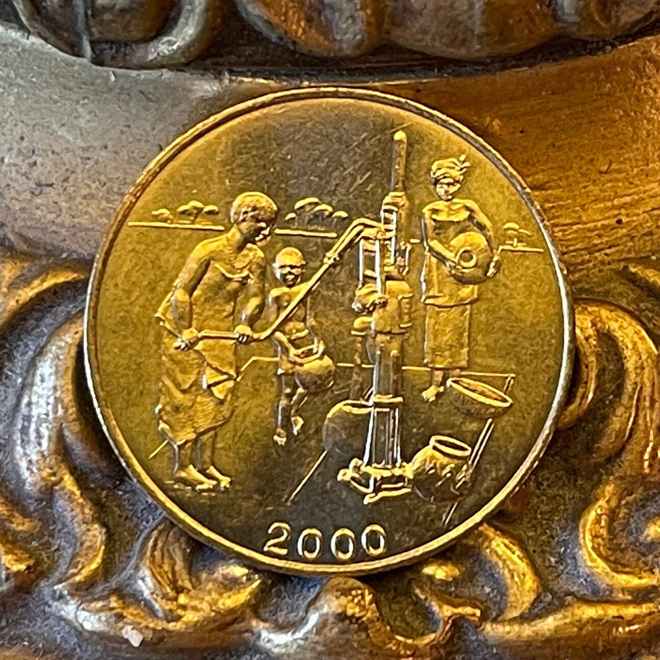 Human Right to Water: Women at Hand-Pump Well & Akan Sawfish Goldweight 10 CFA Francs West African States Authentic Coin Money for Jewelry