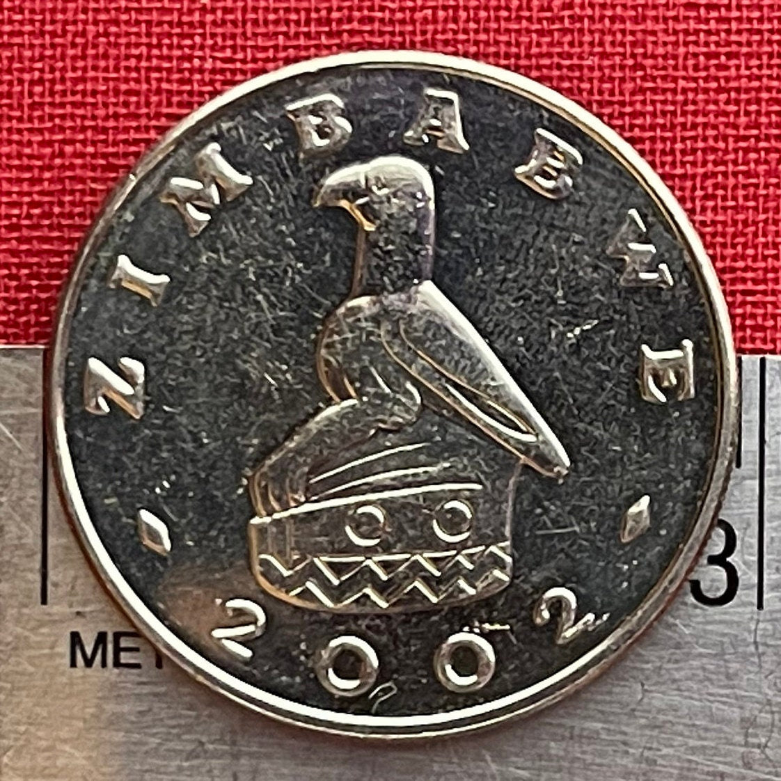 Great Zimbabwe City 1 Dollar Zimbabwe Authentic Coin Money for Jewelry and Craft Making (Great Zimbabwe Bird) (Bacheleur Eagle) (Shona)