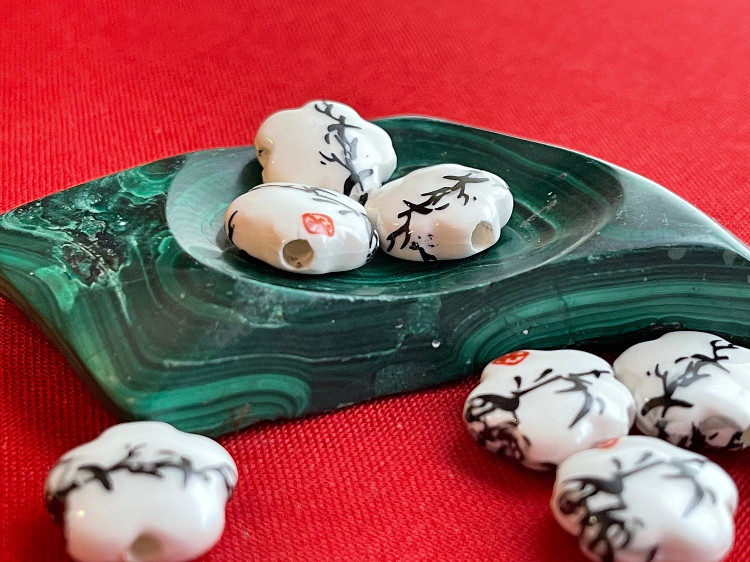 Printed flower-shaped porcelain beads (white with black sumi-e ink bamboo foliage and red seal)–big chunky large hole (lot of 6 or 12 )