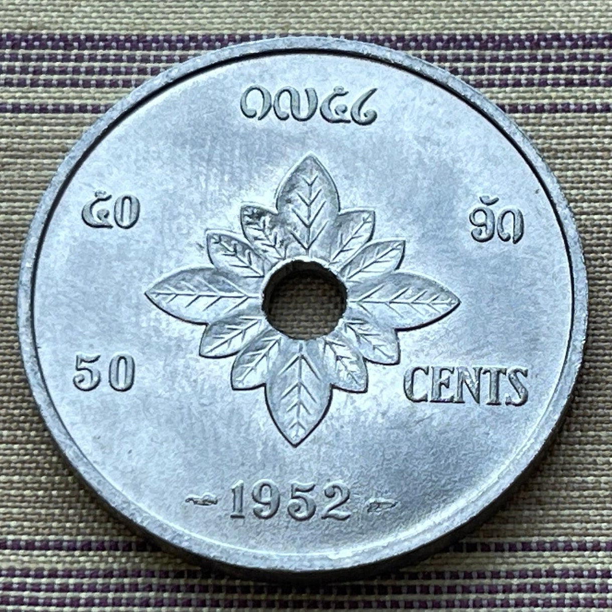 Constitution Book atop Buddhist Almsgiving Bowl 50 Cents Laos Authentic Coin Money for Jewelry (Hole) (Lotus) (Om Enlightenment Symbol) 1952