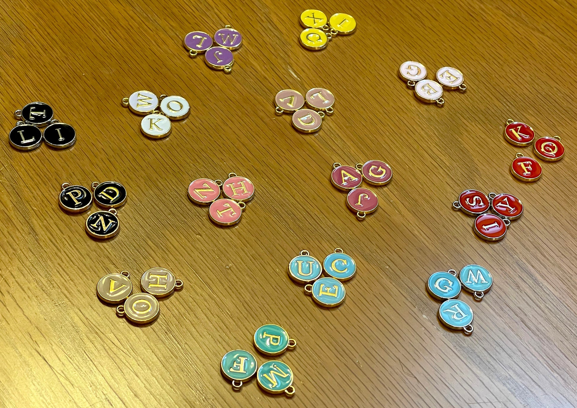 Letter charms–choose black, white, blue, pink, red, yellow, purple or green. Spell name, initials (double sided enamel alphabet jewelry)
