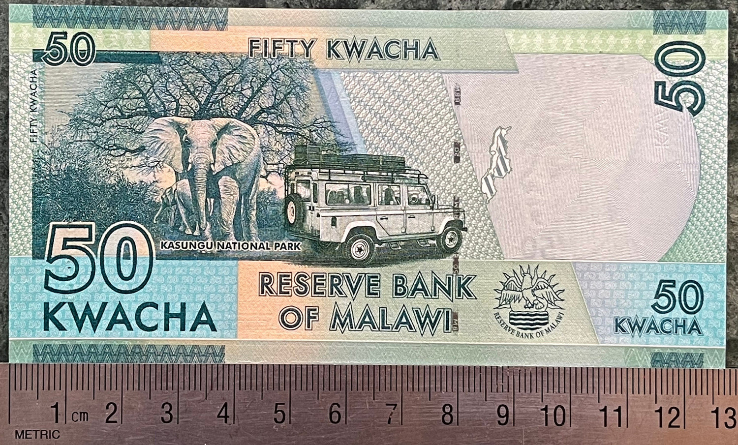 African Bush Elephants, Safari Jeep & Inkosi Ya Makhosi Gomani II 50 Kwacha Malawi Authentic Banknote Money for Collage (Cichlid) (Kasungu)