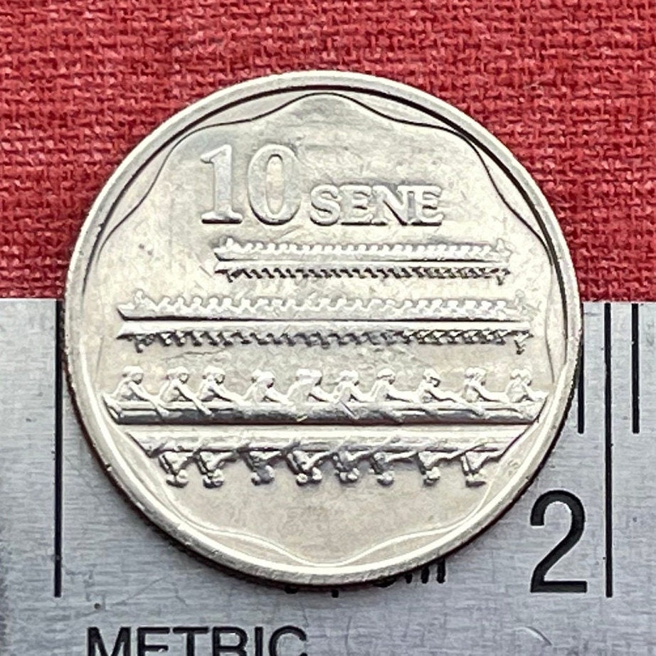 Fautasi Canoe Racers with Mirror Reflections on Water & Tui Ātua Tupua Tamasese Tupuola Tufuga Efi 10 Sene Samoa Authentic Coin for Jewelry