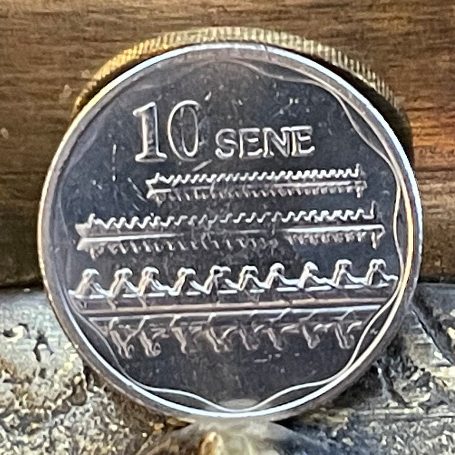 Fautasi Canoe Racers with Mirror Reflections on Water & Tui Ātua Tupua Tamasese Tupuola Tufuga Efi 10 Sene Samoa Authentic Coin for Jewelry